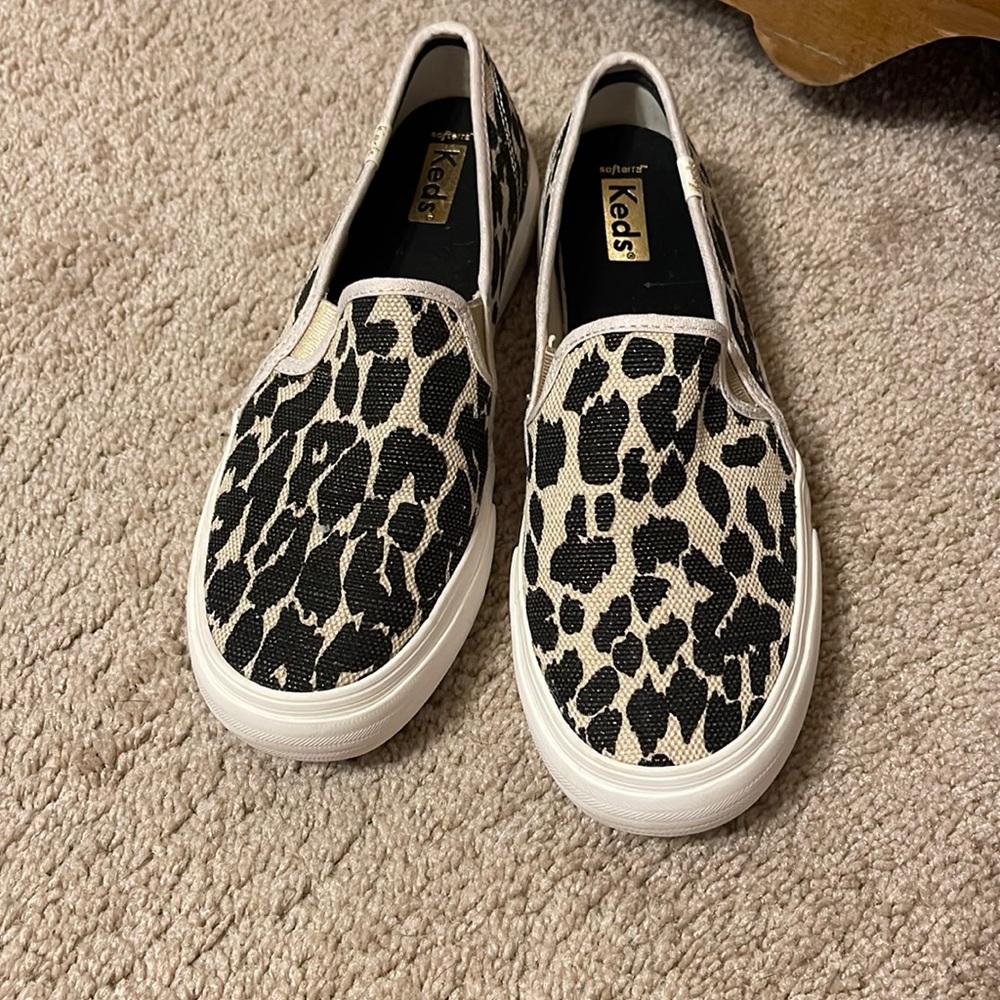 Leopard slip on sneakers